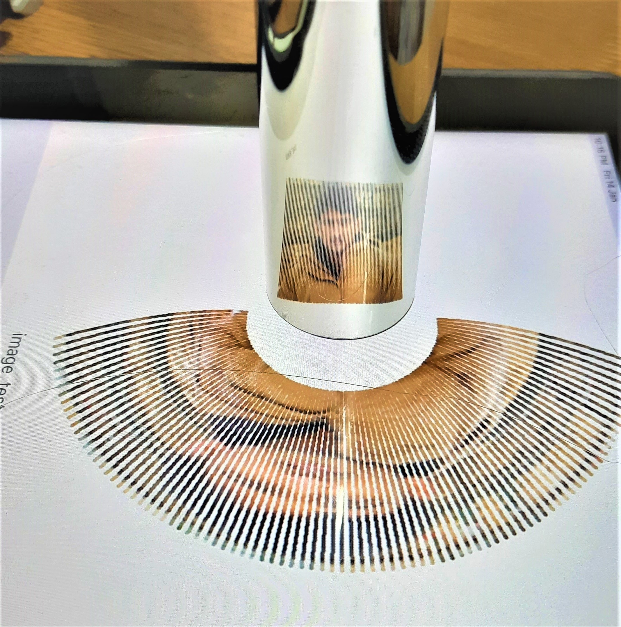 Anamorphosis: Reflection from a Cylindrical Mirror